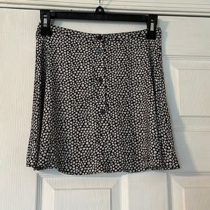 🖤💁♀️DIVIDED ~ Black Skirt with tiny white flowers..fit and flare, Size 4